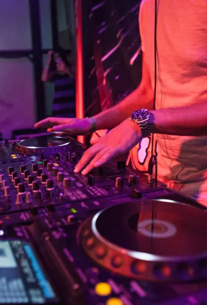 A DJ playing at Reef Hookah & Grill
